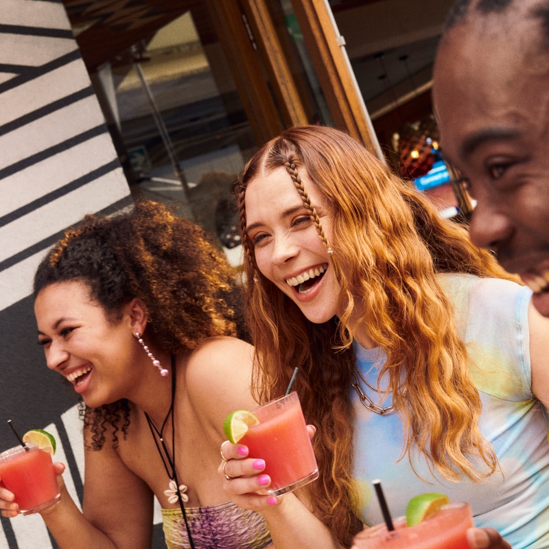 Girl and her friends drinking Nando's frozen cocktails