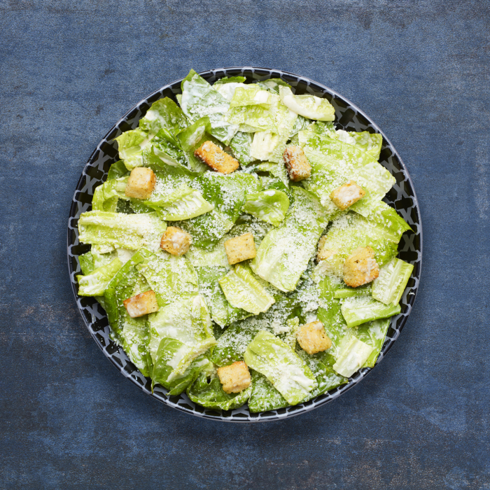 Nando's Caesar Salad on a blue background